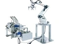 نظام أوتوماتيكي لتغذية ونقل صفائح العلبة المعدنية